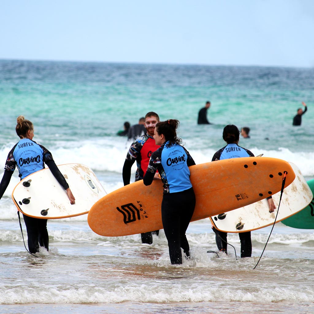 Clase Grupal de Surf | Playa El Palmar